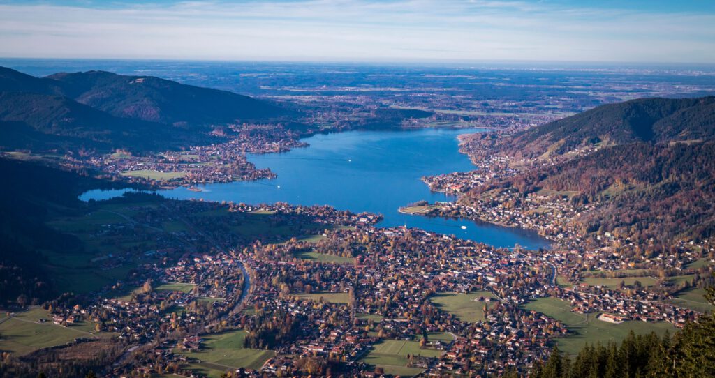 Aerial view of lake Tegernsee with the surrounding beautiful buildings in Bavarian Alps