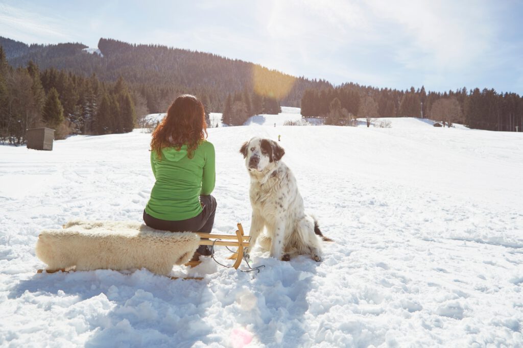 Woman bonding with pet dog